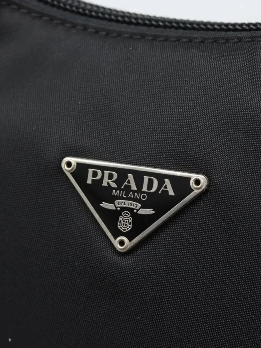 Prada brand	prada color	black